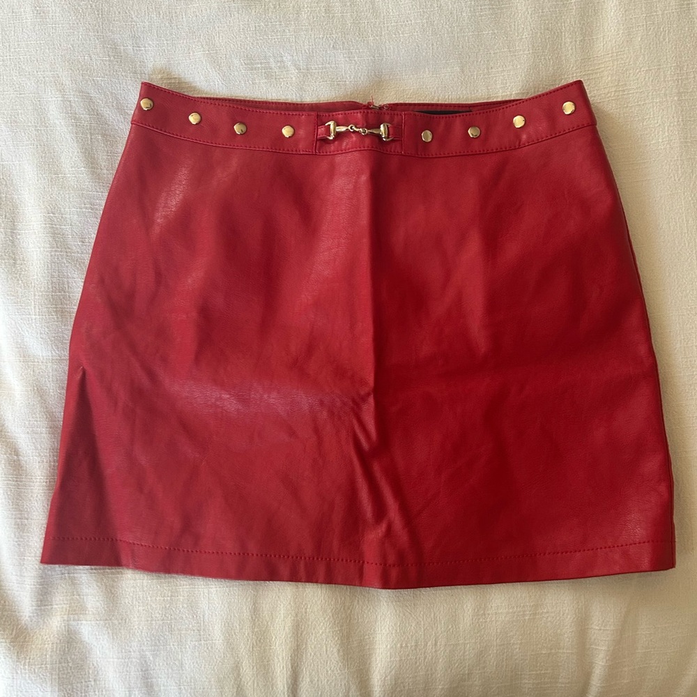 Red leather mini skirt with gold detail!